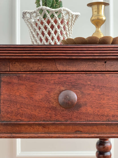 Antique bobbin console table on brass casters