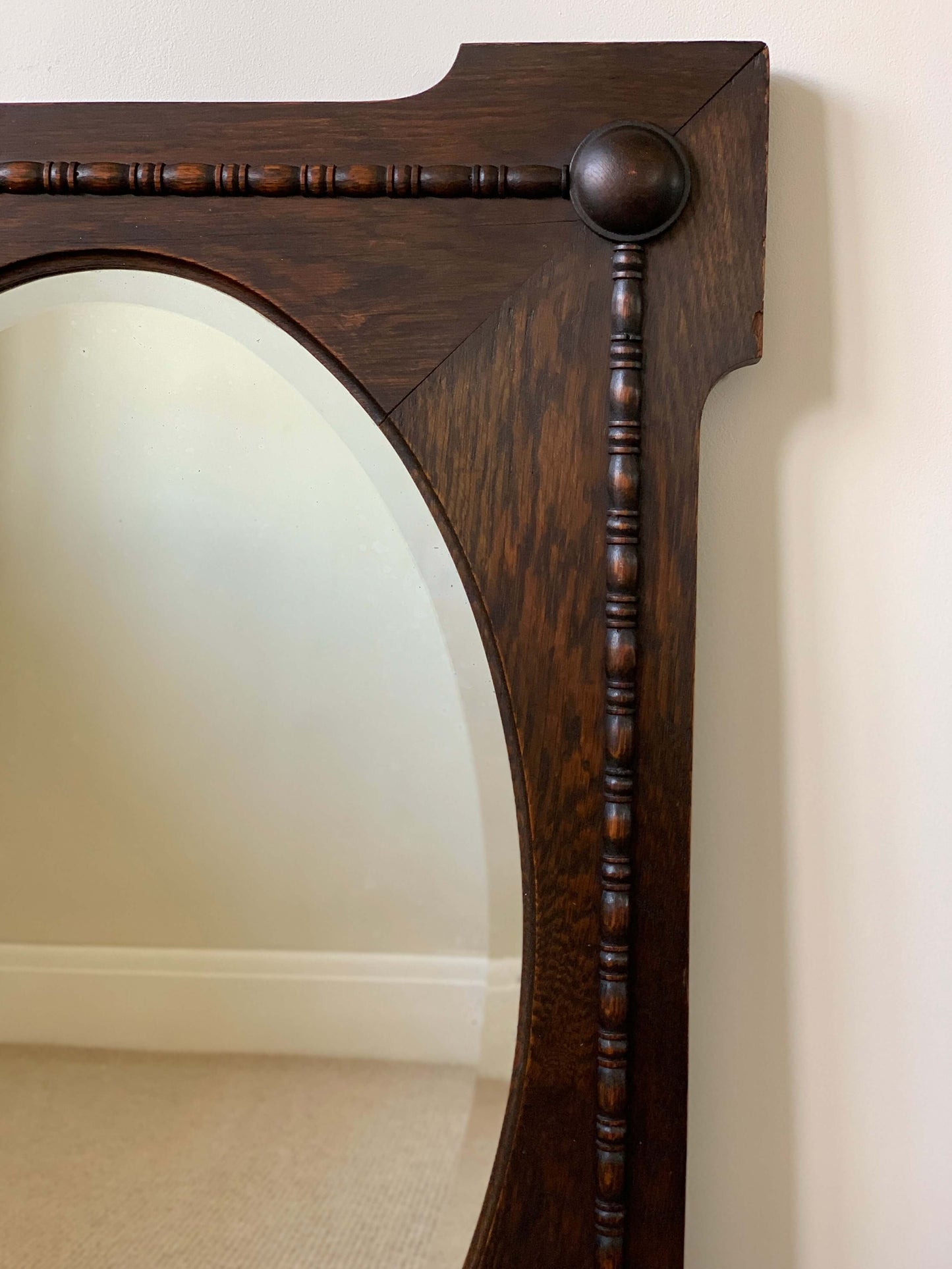 Antique oak oval framed mirror