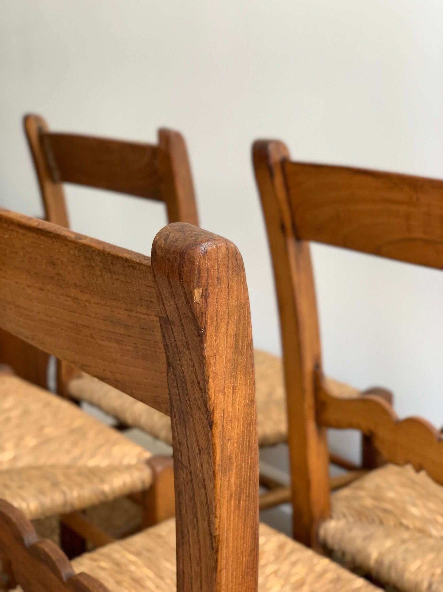 Set of four antique rush dining chairs