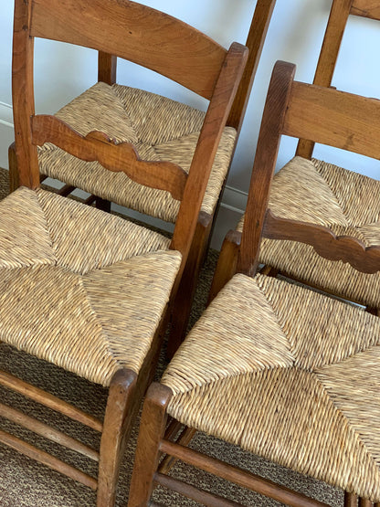 Set of four antique rush dining chairs