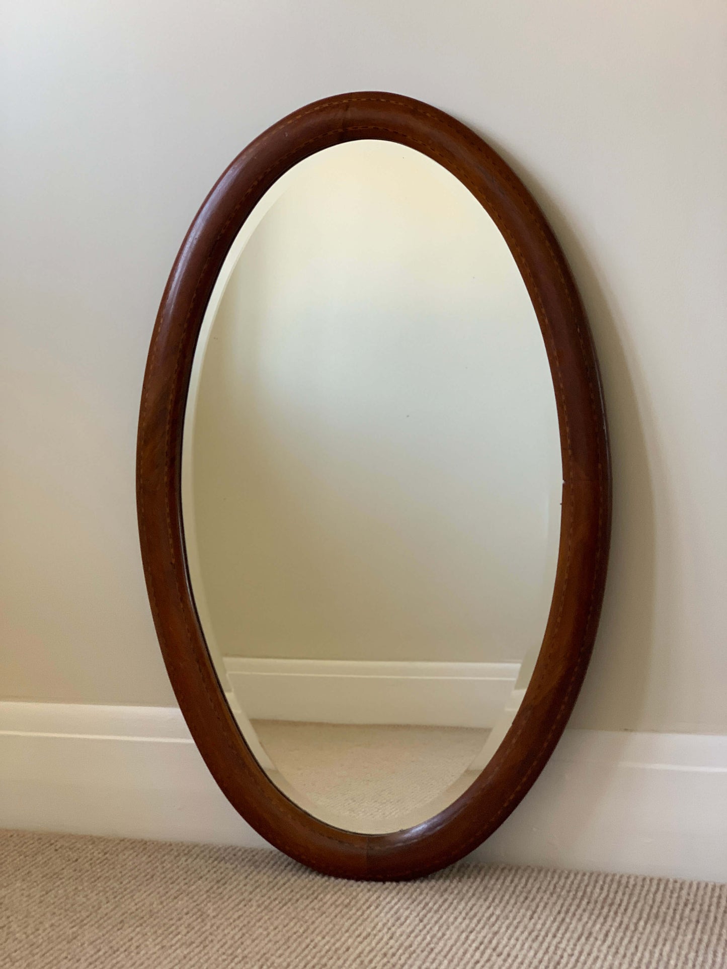 Antique oval mirror with marquetry detail