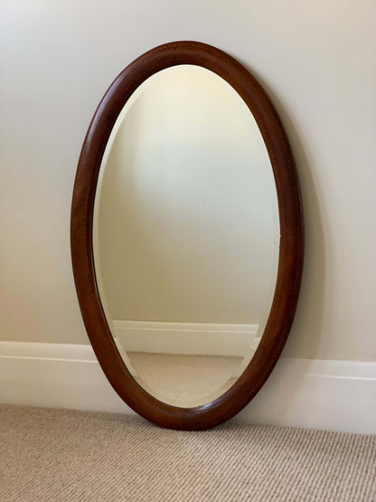 Antique oval mirror with marquetry detail