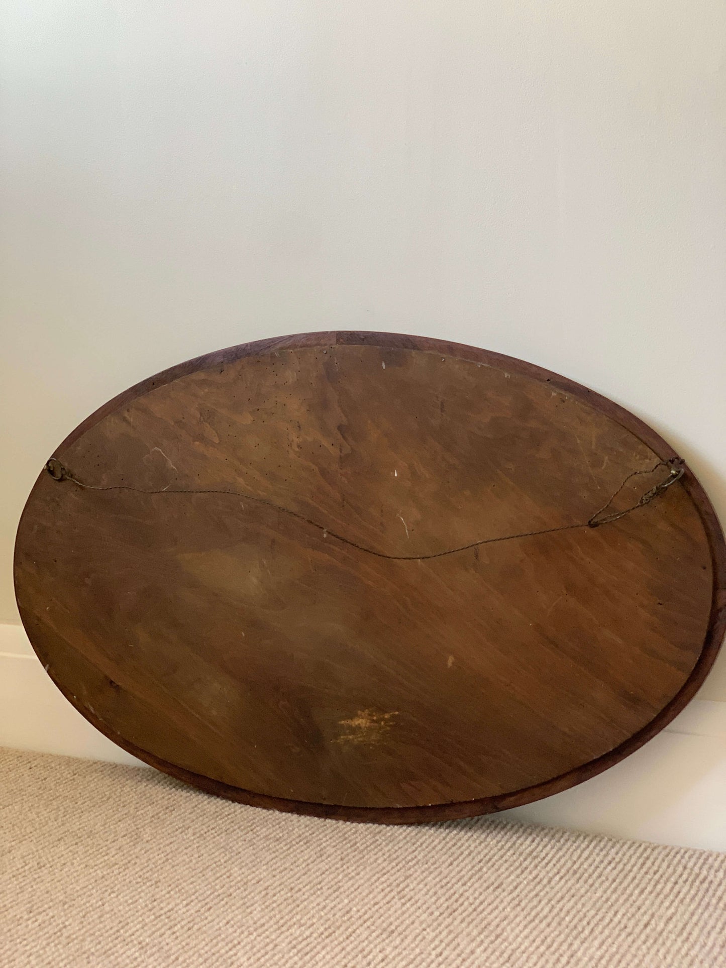 Antique oval mirror with marquetry detail